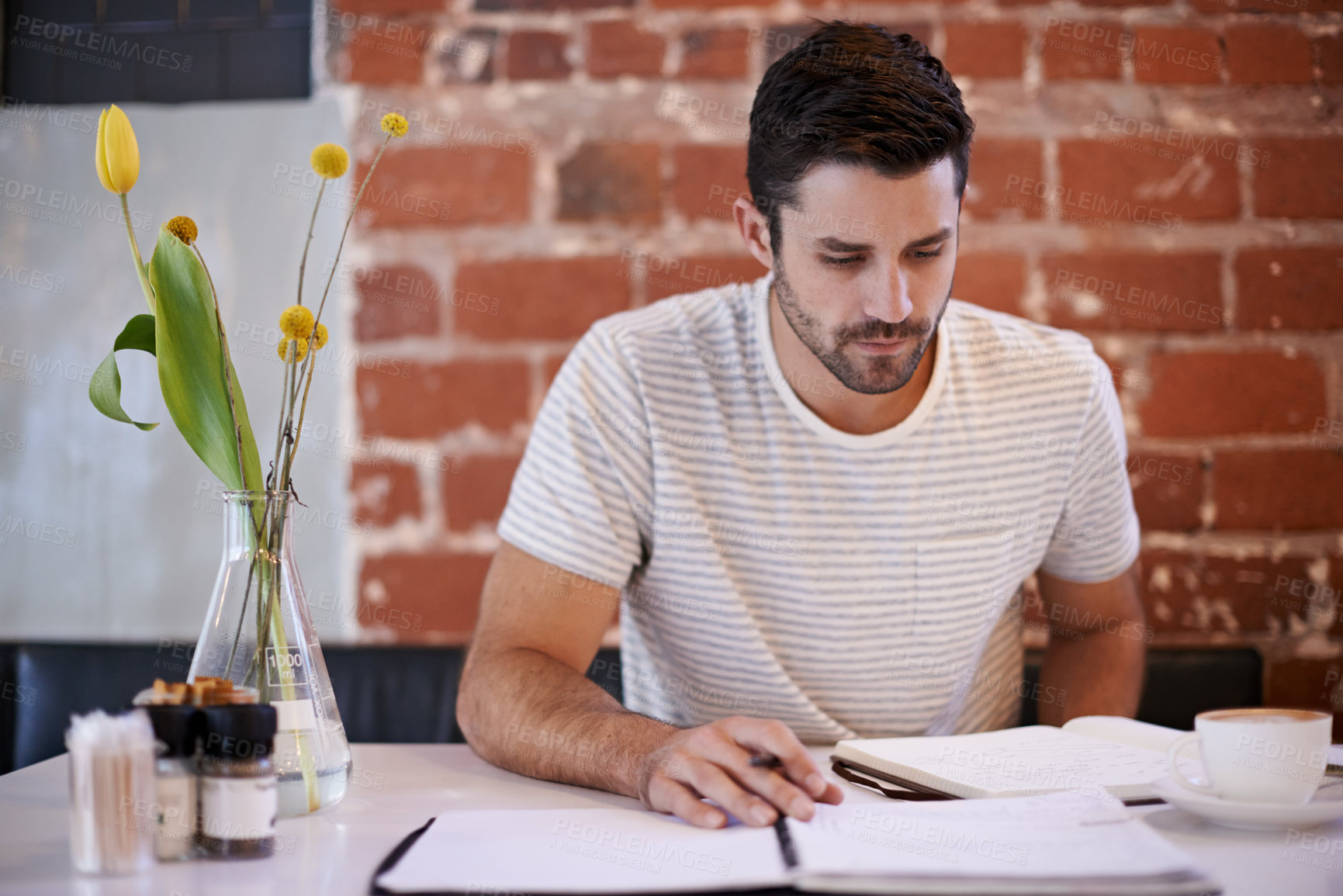 Buy stock photo Man, coffee shop and freelancer journal for writing, inspiration and writer for creativity in restaurant. Male person, journal and plan for story or author, calm and peace in cafe for script project