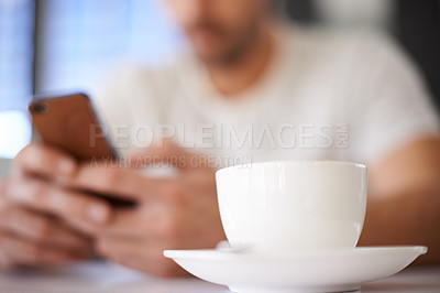 Buy stock photo Man, cup and hands for phone in coffee shop, communication and website for information. Male person, closeup and app for conversation, social media and remote work in restaurant for research by latte