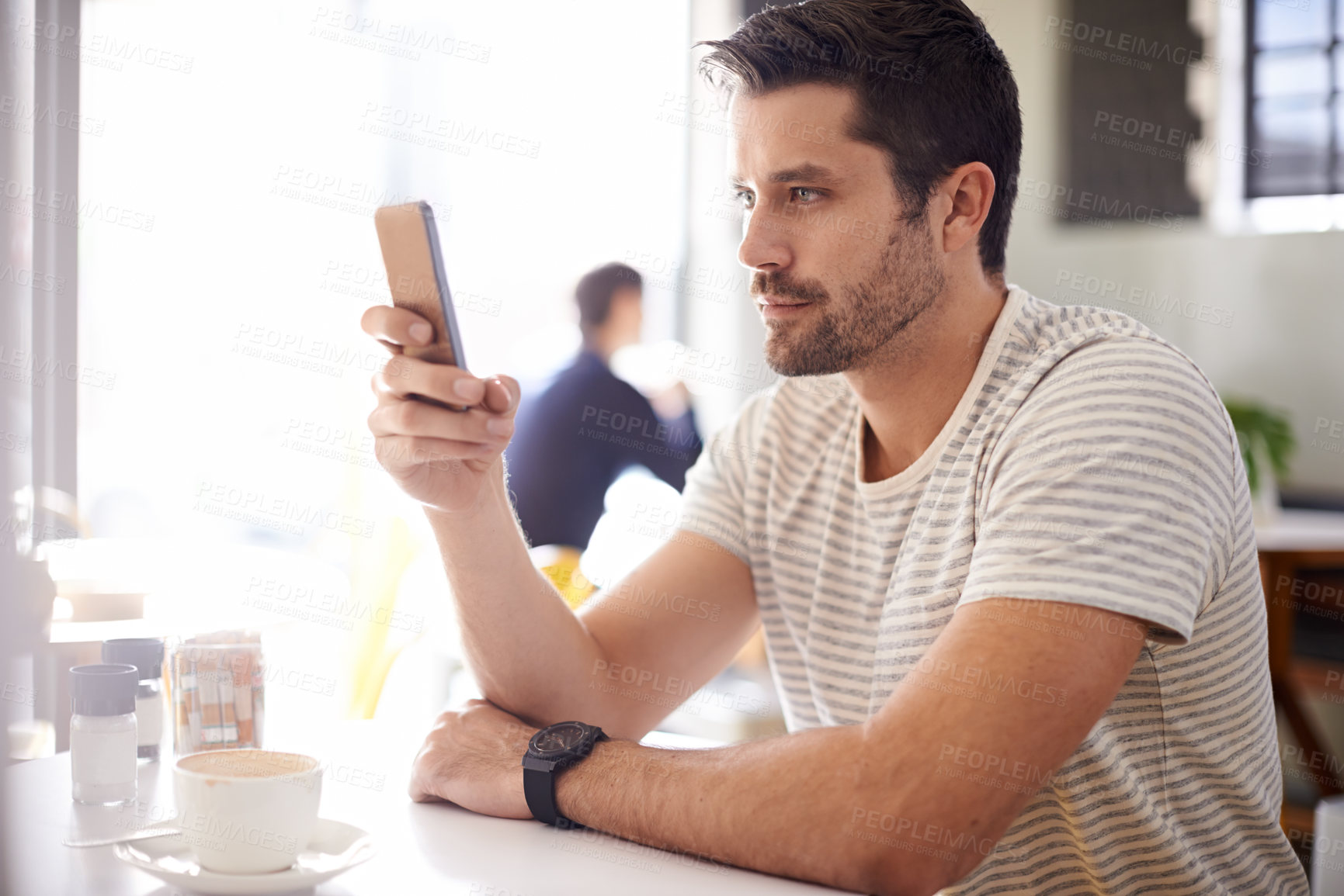 Buy stock photo Man in cafe, smartphone and scroll on social media, reading on mobile app or ebook with communication and contact. Chat, email or text message with tech, search internet and online at coffee shop