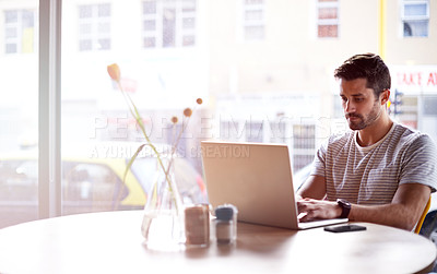 Buy stock photo Coffee shop, online and man with laptop and lens flare doing code work in a cafe. Tech, email and male freelancer customer at a restaurant with mockup and computer writing with focus on web coding
