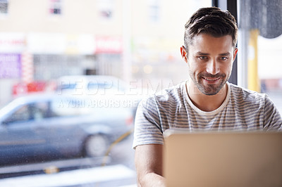 Buy stock photo Entrepreneur, smile and man with a laptop, cafe or typing for information, project or review. Male employee, freelancer or happy worker with connection, technology and search website at a coffee shop