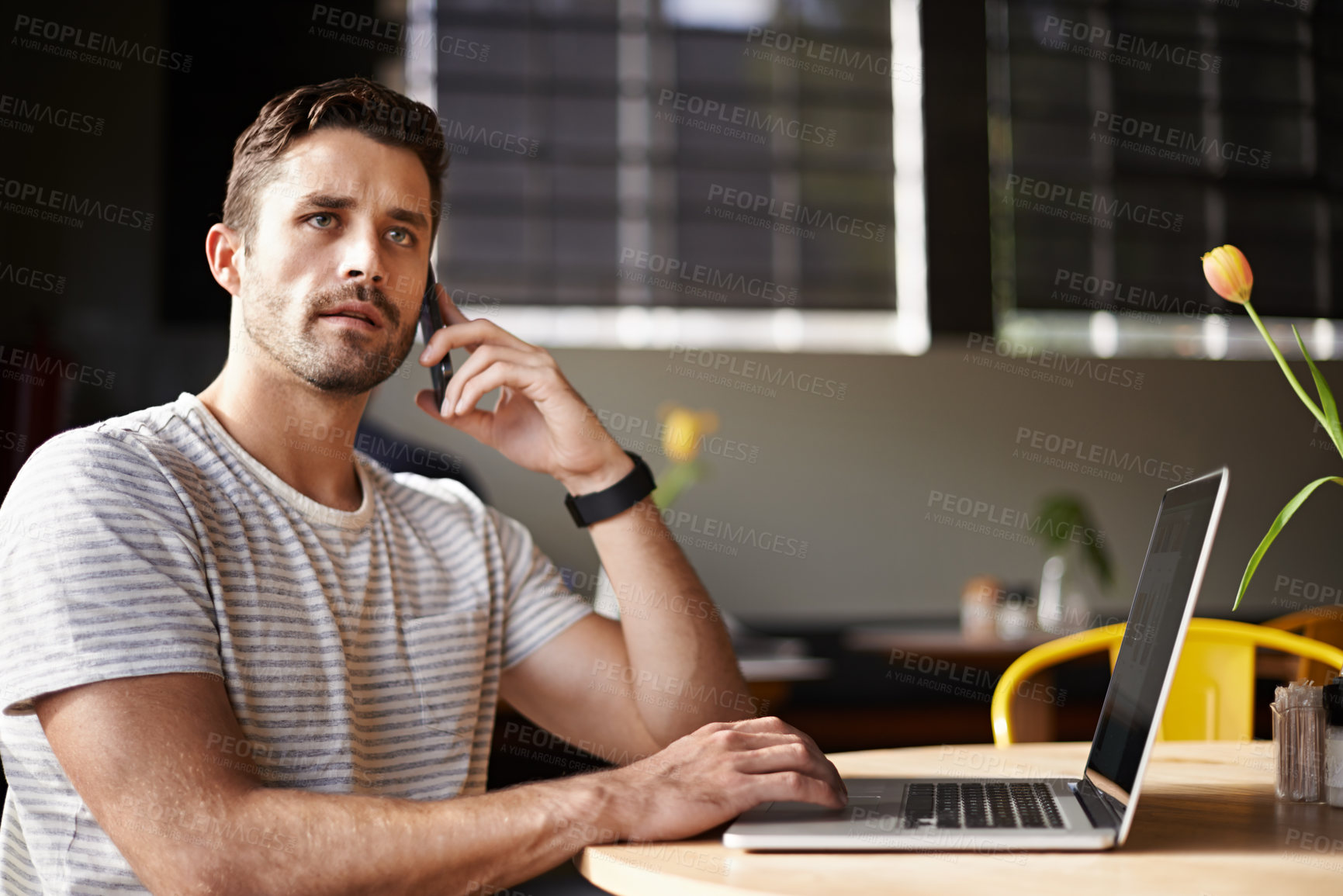 Buy stock photo Thinking, phone call and man in restaurant with laptop for networking, chat and creative professional on website. Computer, ideas and freelancer with online job, cellphone and consulting for project