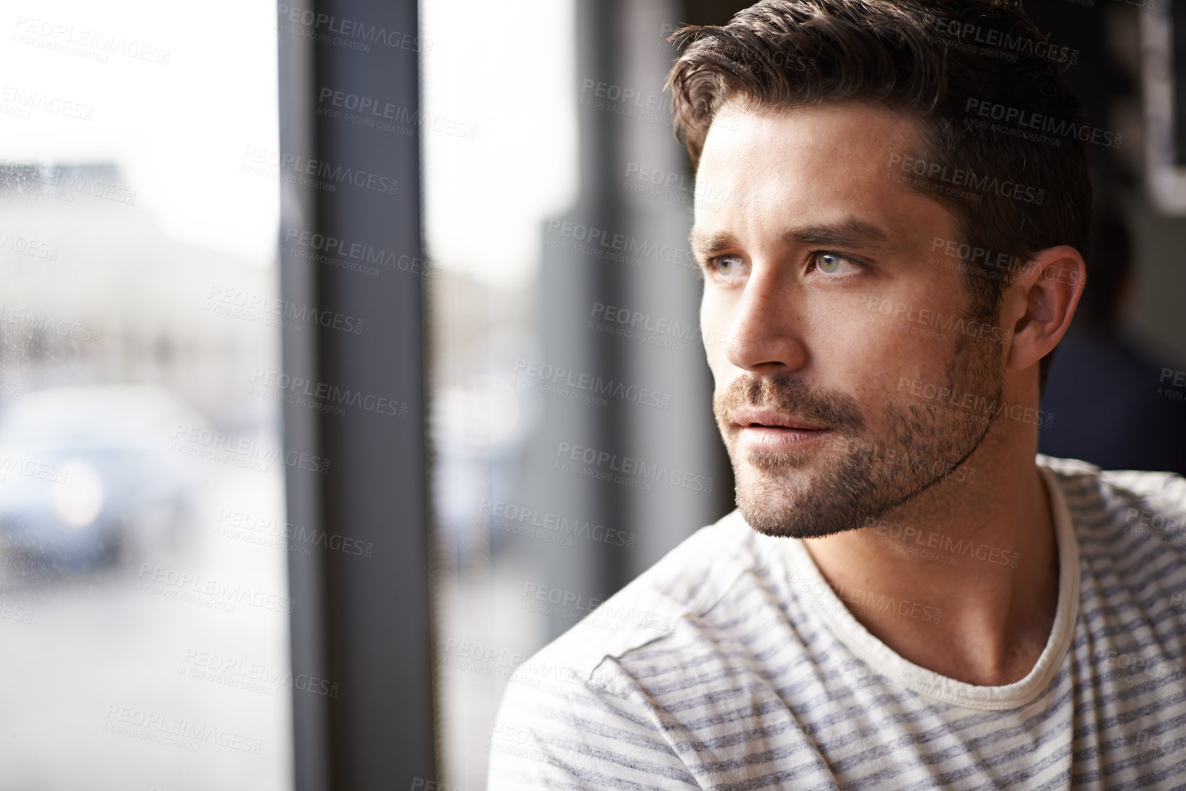 Buy stock photo Handsome man, thinking and vision by window at cafe for ambition, travel or sightseeing. Face of male person waiting in wonder or thought at indoor restaurant or coffee shop for break or reflection