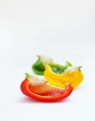 Buy stock photo Vegetables or fruits, bell peppers and in studio or white background. Closeup nutrition or diet, vegetarian and salad meal with different colors for health or food commercial or advertisement 