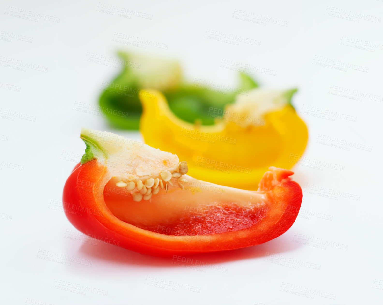 Buy stock photo Studio shot of sliced bell peppers