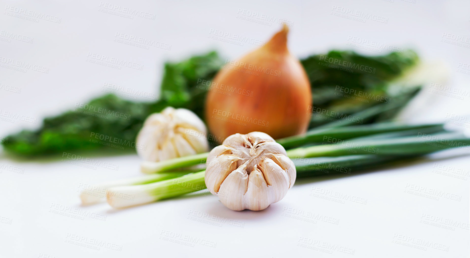 Buy stock photo Vegetable, ingredients and healthy food in studio with garlic, onions and scallions for creativity. Cooking, wellness diet and nutrition with clean, green or vegan meal isolated on a white background