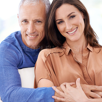 Buy stock photo Couple, age difference and hug in portrait, love with unique relationship and support for trust at home. Senior man, young woman in marriage, commitment and loyalty with partner and pride together