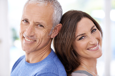 Buy stock photo Shot of an affectionate young woman and her mature husband