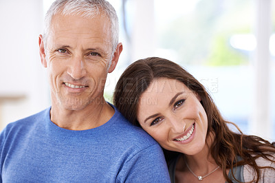 Buy stock photo Happy, couple, and face with smile in portrait, love with unique relationship and support for trust at home. Senior man, young woman and marriage, commitment and loyalty with pride together.