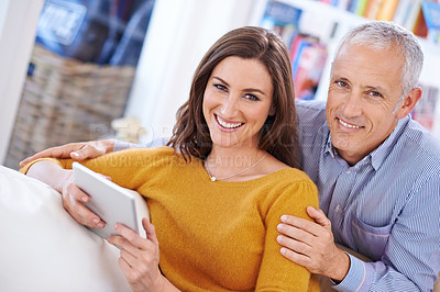 Buy stock photo Couple, portrait and smile with tablet on sofa with hug for bonding, love and relax with social media or internet. Senior man, woman and happy face with technology for subscription or embrace in home