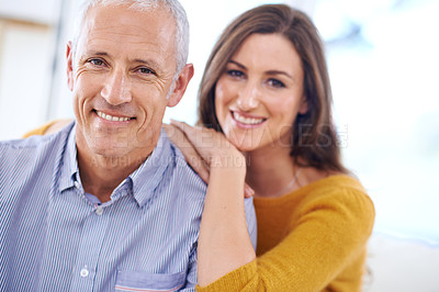 Buy stock photo Couple, age difference and relax in portrait, love with unique relationship and support for trust at home. Senior man, young woman in marriage, commitment and loyalty with partner and pride together