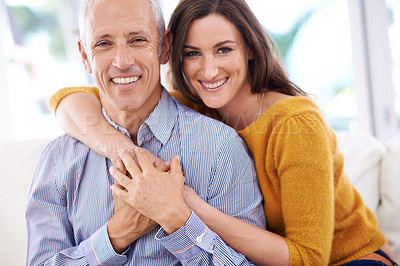 Buy stock photo Happy couple, age difference and smile in portrait, love with unique relationship and support for trust at home. Senior man, young woman in marriage, commitment and loyalty with hug and pride
