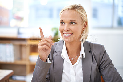 Buy stock photo Woman, smile and point with thinking at office desk in career at law firm for justice, crime or investigation. Lawyer, advocate or attorney with ideas, vision and happy for decision, evidence or case