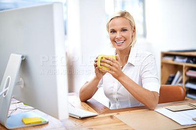 Buy stock photo Portrait of a young businesswoman drinking coffee at her desk
