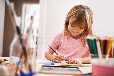 Buy stock photo Happy child, writing and drawing with color for creativity, learning or education at home. Young girl with color pencil for sketching, activity or artwork in early childhood development at the house