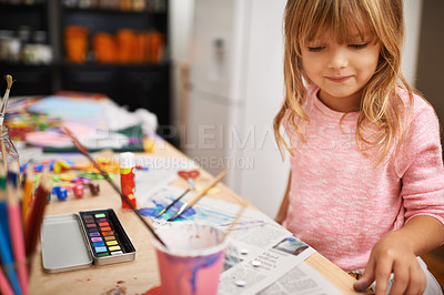 Buy stock photo Happy girl, paint and drawing with color for creativity, learning or education at home. Young child with smile and paintbrush for sketching, writing or artwork on table in happiness at the house