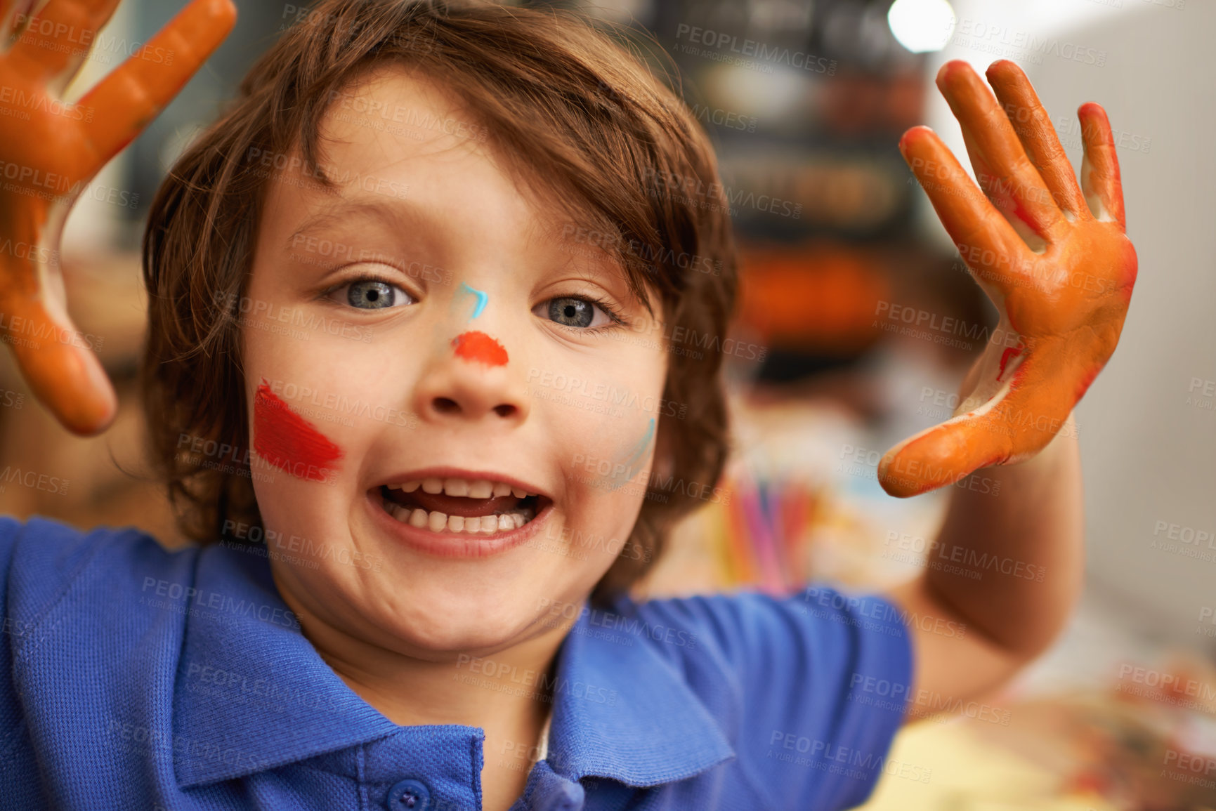 Buy stock photo Happy boy, portrait and hands with face paint for artwork, craft or creativity at elementary school. Little male person, child or kid with smile for colorful art, youth or early childhood development