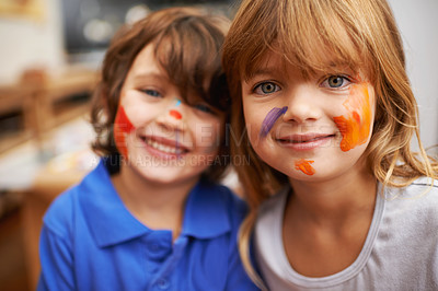 Buy stock photo Happy children, portrait or paint on face in home, art or bonding together in creativity on weekend. Siblings, brother or sister in smile for learning craft, painting or extra mural activity in house