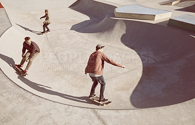 Buy stock photo Fitness, friends and sports men with skateboard, ramp or bowl action at skate park for stunt training. Freedom, adrenaline and gen z skater people with energy, balance or skill, fun or performance