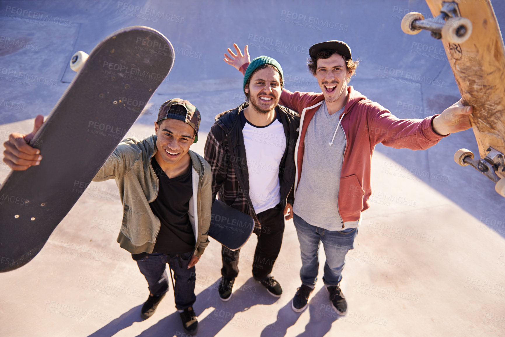 Buy stock photo Skateboard, portrait and friends at a city park for training, fun or bonding session from above. Happy, face or top view of gen z skater men outdoor for travel, vacation or weekend reunion with hobby