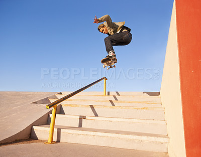 Buy stock photo Freedom, fitness and man with skateboard, jump or rail balance at skate park for steps stunt training. Energy, adrenaline and gen z male skater with air, sports or stairs, exercise and performance
