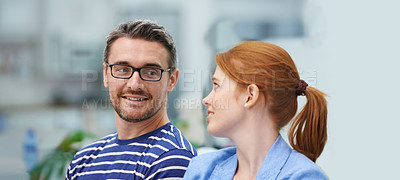Buy stock photo Man, woman and smile in startup office for conversation, team or advice for decision at company. Business people, happy and talk for negotiation, planning or listen to ideas at creative media agency