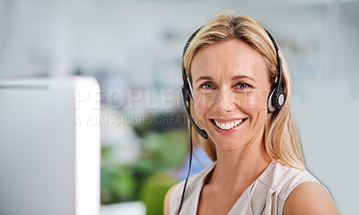Buy stock photo Attractive female with headsets smiling at work