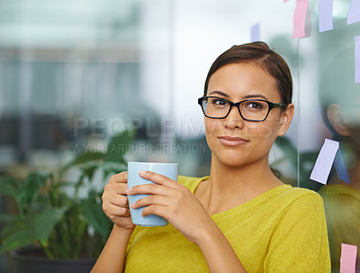 Buy stock photo Shot of an attractive female on her coffee break at work