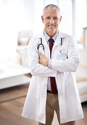 Buy stock photo Portrait, medicine and doctor with arms crossed in hospital for support, services and wellness. Healthcare, lens flare and happy mature medical professional for confident, help and treatment