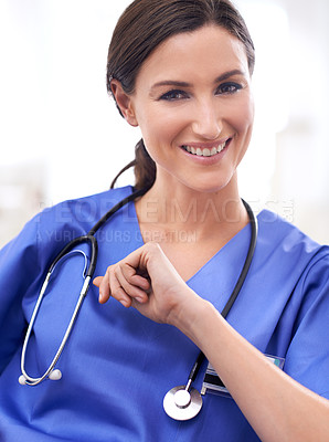 Buy stock photo Portrait, nurse and happy woman in hospital for healthcare, wellness or working on career in Spain. Face, medical professional and smile of surgeon, employee or expert doctor in clinic for service