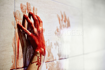 Buy stock photo A cropped shot of a woman's bloody hands on a bathroom wall