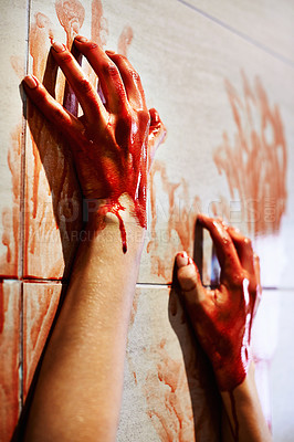 Buy stock photo A cropped shot of a woman's bloody hands on a bathroom wall