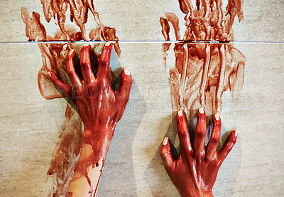 Buy stock photo A cropped shot of a woman's bloody hands on a bathroom wall