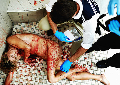 Buy stock photo Shot of investigators working their way through a bloody crime scene