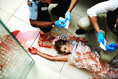 Buy stock photo Shot of investigators working their way through a bloody crime scene