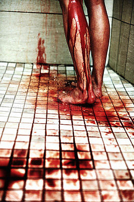Buy stock photo A cropped shot of a woman covered in blood standing in the shower