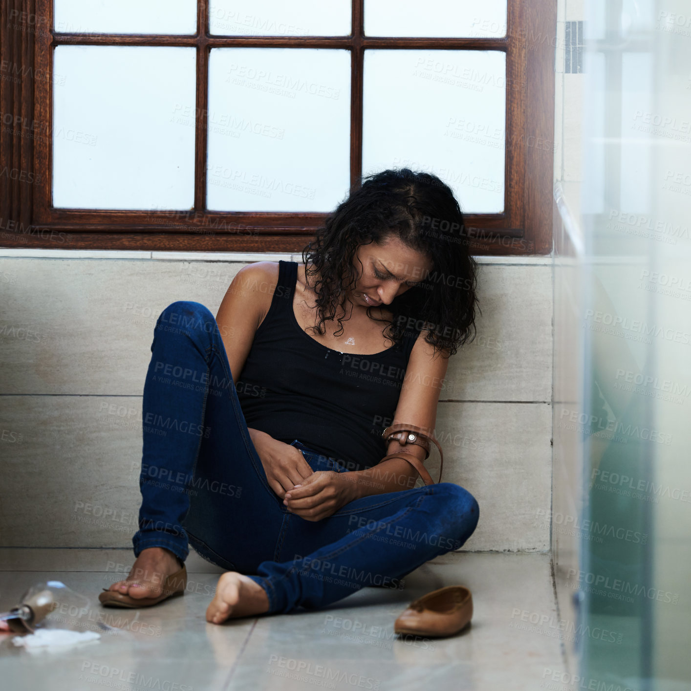 Buy stock photo Woman, drug addict and overdose in bathroom for addiction or withdrawal symptoms, depression and mental health. Person or user, relapse and belt for heroin or substance abuse for feeling of euphoria