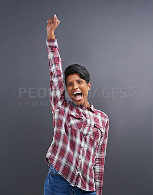 Buy stock photo Happy, portrait and Indian person with excited win with gray background from creative agency promotion. Hipster, confidence and employee smile with wow, yes and winner at job with achievement