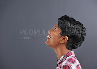 Buy stock photo Happy, profile and Indian person with idea with gray background at a creative agency office. Thinking, confidence and female employee with modern and casual clothing with worker fashion smile