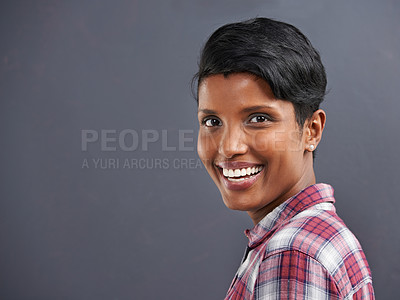 Buy stock photo Happy, portrait and Indian person with smile with gray background at a creative agency office. Hipster, confidence and non binary employee with modern and casual clothing with fashion and style