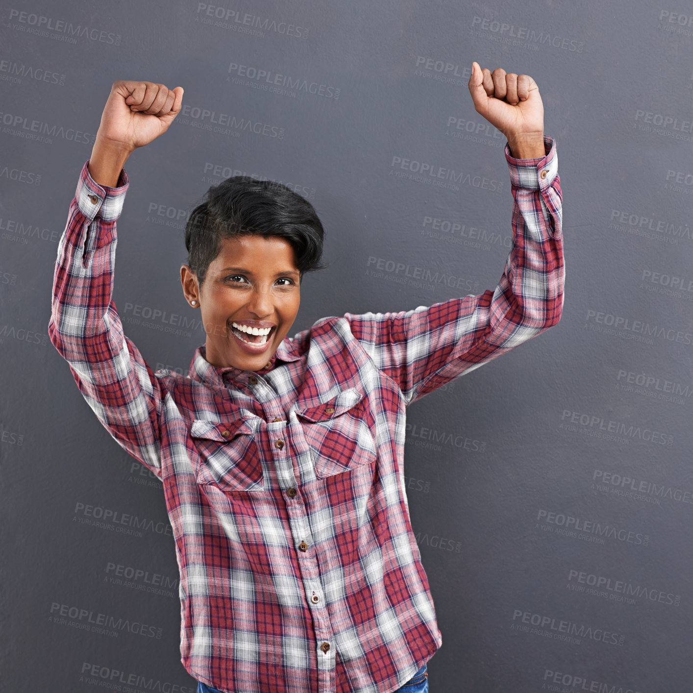 Buy stock photo Excited woman, portrait and dancing with fashion for winning or celebration on a gray studio background. Happy female person, Indian or model with smile for success, style or clothing on mockup space