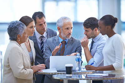 Buy stock photo A cropped shot of a diverse group of businesspeople having a meeting