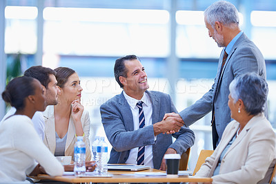 Buy stock photo Coworker, boardroom and handshake with smile for success on deal, contract and teamwork. Diverse, office and happy with business achievement with congratulations as ceo or leader of company.