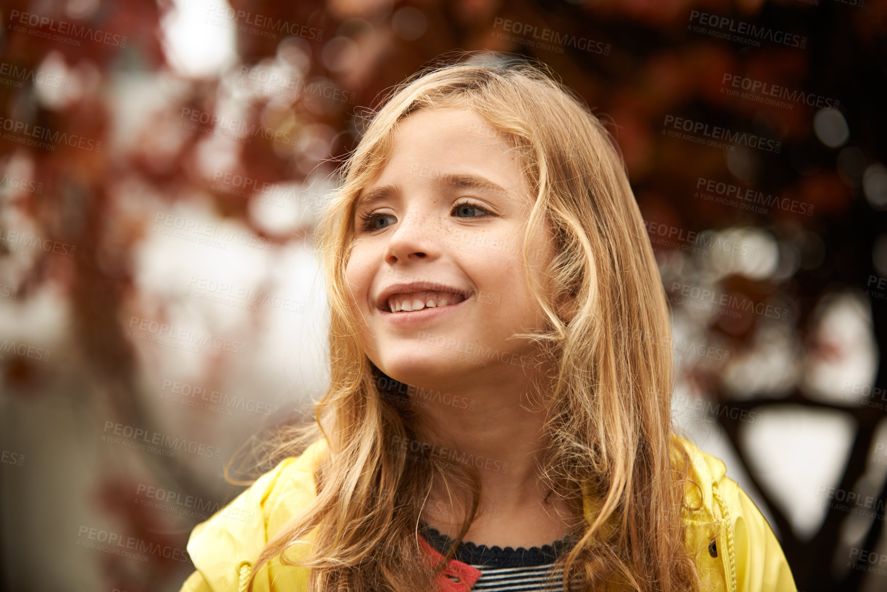 Buy stock photo Smile, thinking and happy girl in autumn, winter and outdoors for cold weather. Face, child and joyful in winter season or rain on vacation in Scotland, holiday or outside for freedom or travel