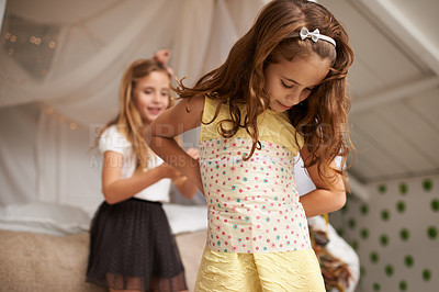 Buy stock photo Young girls, dress up and fun in bedroom of home, clothes and sisters for bonding. Imagine, clothing or creative play with sibling in family house, costume or smile or happy for childhood development