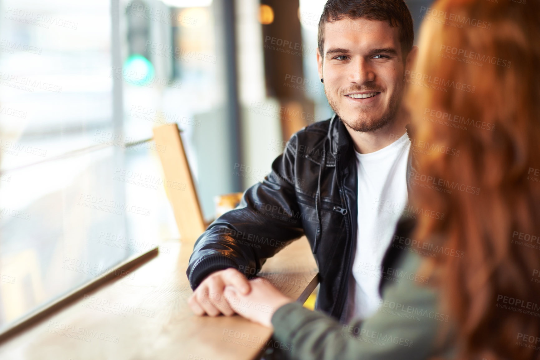 Buy stock photo Man, couple and date in coffee shop, hand holding for love and romantic affection. Boyfriend, support together for bonding relationship, female person at table for trust comfort and compassion