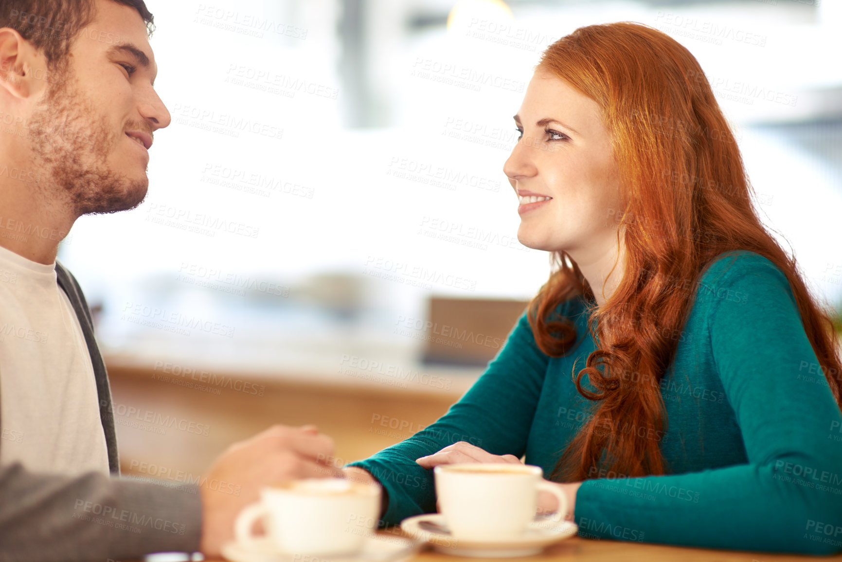 Buy stock photo Couple, smile and eye contact for love in coffee shop, support and happiness for peace in relationship. Adult, woman and girl together with man or partner in cafe, excited and marriage with guy