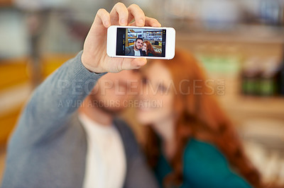 Buy stock photo Couple, selfie and hand with smartphone, screen and profile picture of man and woman together in cafe. Happy people, portrait and photography on cellphone for social media or smile in relationship