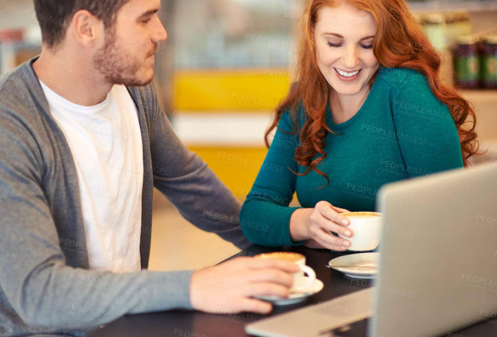 Buy stock photo Laptop, restaurant and couple with coffee, date and bonding together with happiness and conversation. Love, cafe and computer with man and woman with smile and morning with cappuccino and cheerful