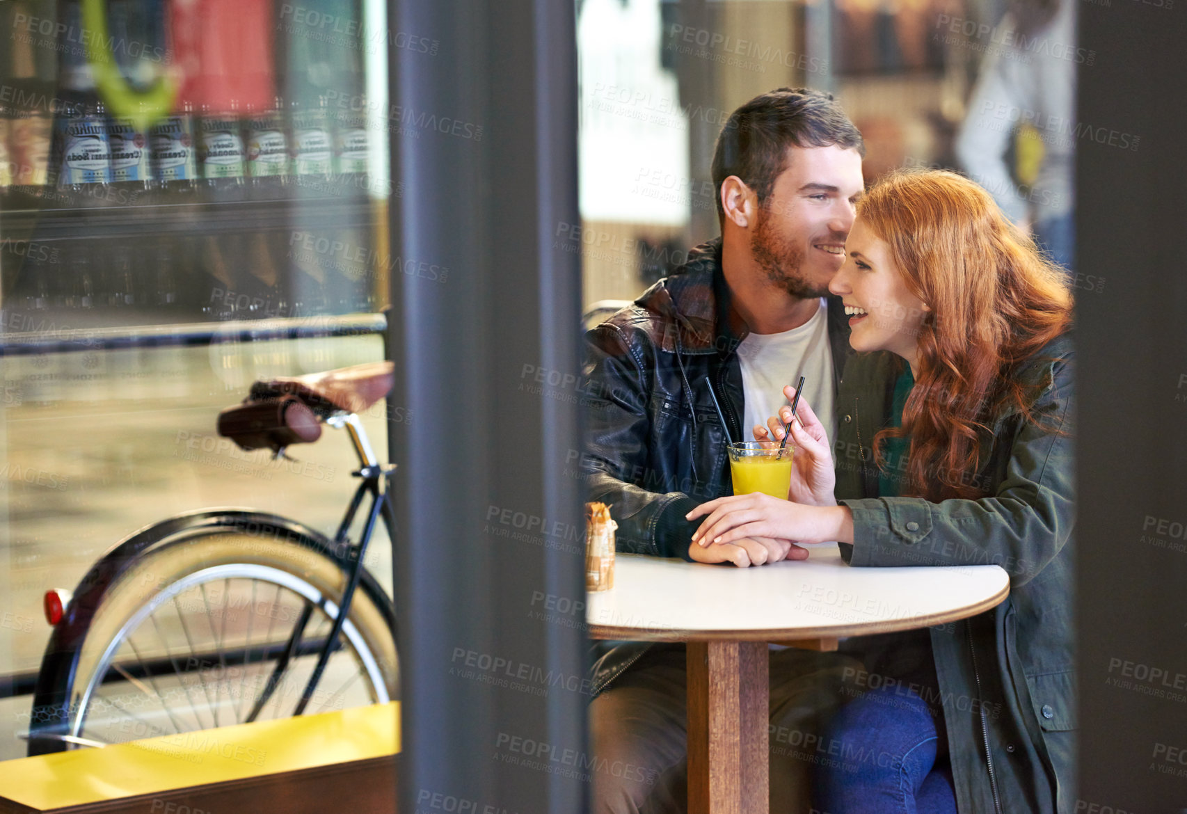 Buy stock photo Laugh, happy and couple in cafe for care on date for relationship anniversary with commitment, support and trust. Man, woman and in love together, hand holding and affection in restaurant for bonding
